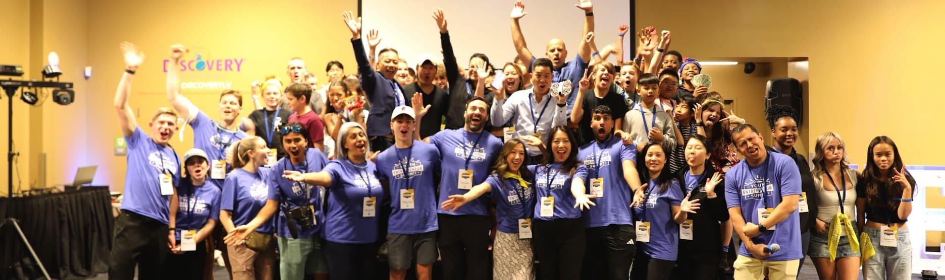 Students and mentors celebrating together at the Summit